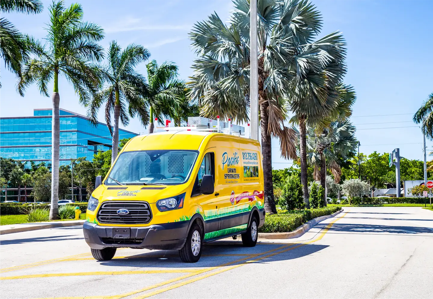Pacific Lawn Sprinklers yellow service truck